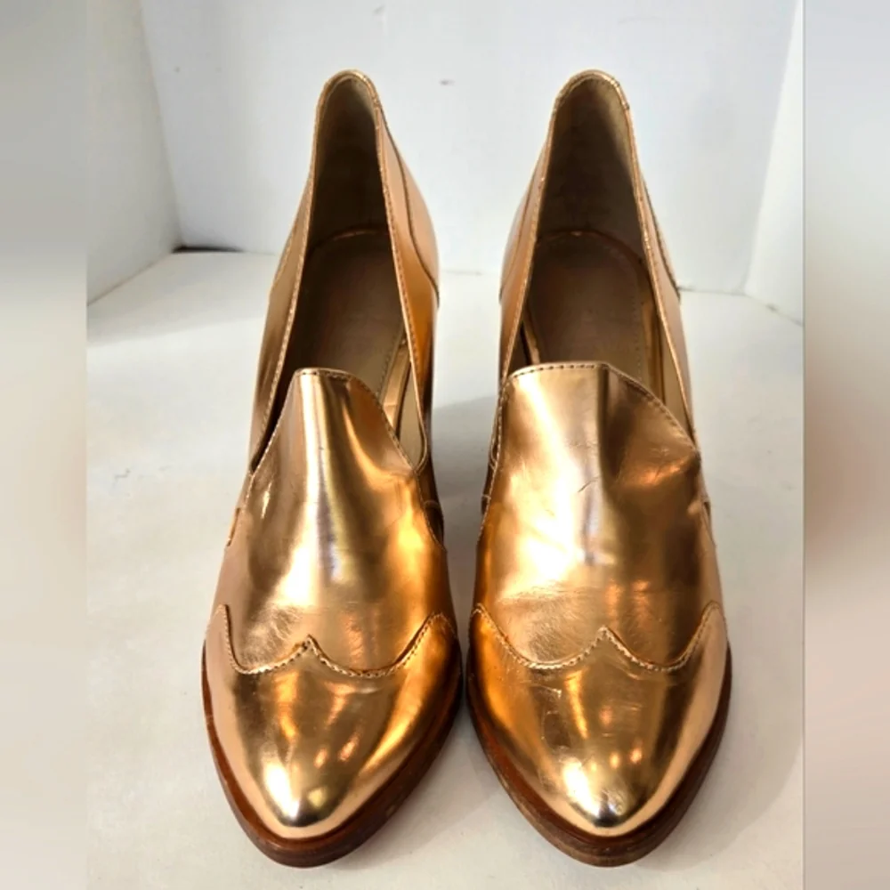 The office of Angela Scot Elegant Rose Gold Metallic Heels